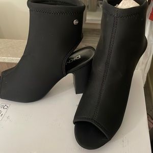 Shoe barely worn once , tried to wear them a month ago but was unable to.